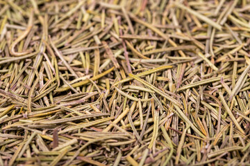 Dried rosemary spice background. Spices concept. Dry seasoning rosemary. Spices and herbs for cooking. Close up