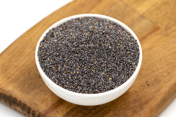 Blue poppy seeds. Spices concept. Blue poppy seeds isolated on white background
