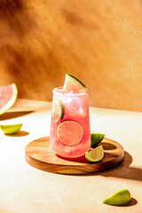 Watermelon vodka limeade, pink summer long drink cooler
