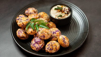 An Indian goto breakfast made with vegetables rice and pulses. 