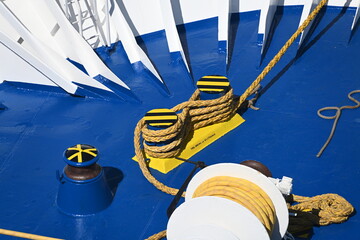 yellow rope on a blue deck background.