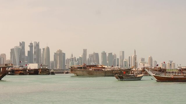 Doha, Qatar.
04.27.2023.
Traditional wooden dhow anchored at Dhow Harbor in Doha Bay. View from Corniche promenade, Middle East, Arabian Gulf.
sailboats