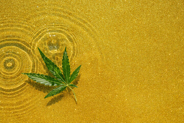 Background with precious cannabis CBD oil with circles, ripples, marijuana leaf