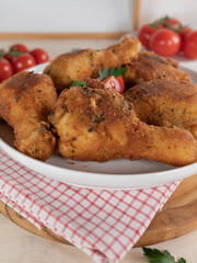 Crispy chicken drumsticks with parmesan, breadcrumb breading
