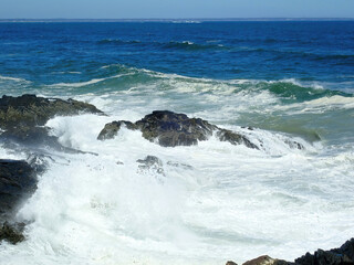 Ocean waves meeting the shore