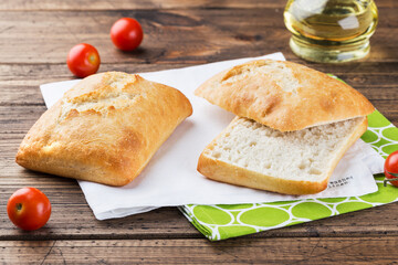 Ciabatta bread on wooden background