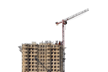 Under construction building against the sky and tower cranes, isolated on a white background. Unfinished construction house