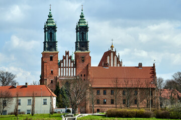 Historic buildings and towers of the gothic cathedral in the city of Poznan