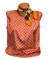 Women's silk scarf on a mannequin and pink jacket with white polka dots. shawl. On an isolated...