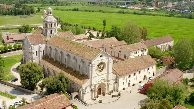 Aerial view of Fossanova Abbey located in Priverno, in the province of Latina, Italy. The church is a national monument and a perfect example of the transition from Romanesque to Italian Gothic.