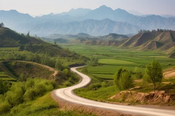 Fotobehang mountain winding road summer landscape with green vegetation generative ai © Poter