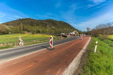 Bagr on the construction of a new road in the Czech Republic. Construction work. Reconstruction of the road.