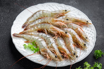 raw shrimp gambas prawn seafood meal food snack on the table copy space food background rustic top view