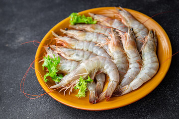 raw shrimp gambas prawn seafood meal food snack on the table copy space food background rustic top view