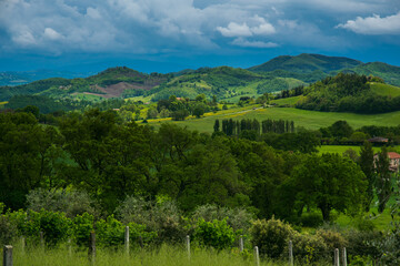 Fototapeta na wymiar View of beautiful countryside near Scheggia village in Umbria with green field, Italy