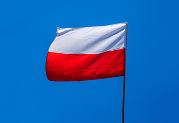The red and white flag of the Republic of Poland flying on May 3 over the city of Bialystok in Podlasie, Poland.