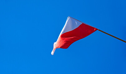 The red and white flag of the Republic of Poland flying on May 3 over the city of Bialystok in Podlasie, Poland.