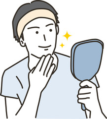 鏡をみながらスキンケアをする笑顔の男性

