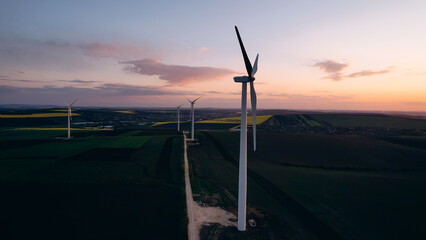 Wind turbines or windmill help to obtain ecological and efficient electricity.Green energy is ...