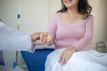Physical therapists are advising elderly person to get them to do physical therapy at regular...