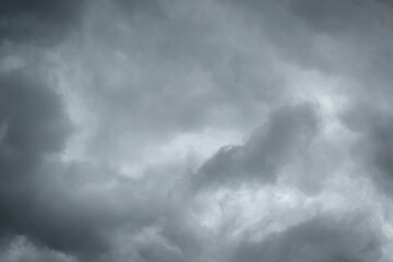 Dark sky with thunderstorm while raining. Dramatic black clouds before the rain.