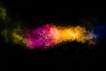 Multicolored powder explosion on black background.Colorful of pastel powder explosion.