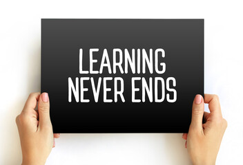 Learning Never Ends text on card, concept background