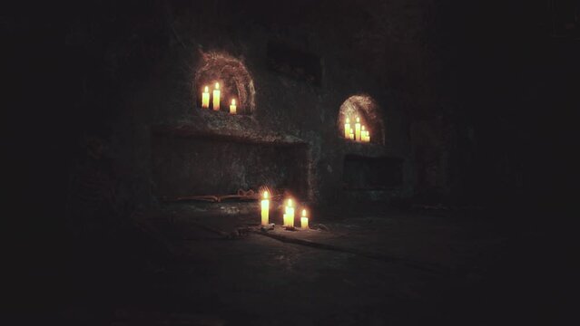 old dark catacombs with candles