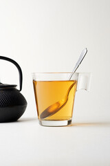 Glass cup with hot tea