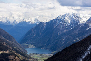 view from the famous swiss mountain train station alp grüm to the lake Poschiavo