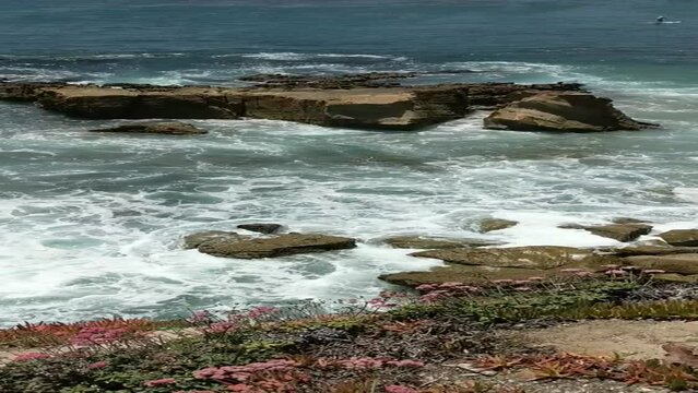 Waves crashing on rocks