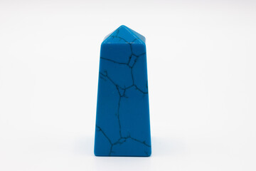 Blue howlite mineral on white background
