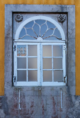 Spectacular window of the National Palace of Pena in Sintra Portugal of romantic style construction