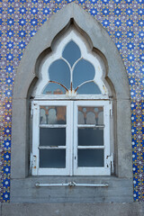 Spectacular window of the National Palace of Pena in Sintra Portugal of romantic style construction
