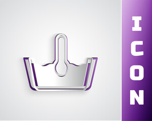 Paper cut Temperature wash icon isolated on grey background. Temperature wash. Paper art style. Vector