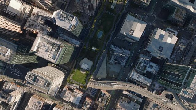 Birds eye shot of Salesforce Park and surrounding downtown high rise office buildings. San Francisco, California, USA