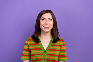 Photo of gorgeous pretty lady wear bright clothes looking empty space special offer isolated on purple color background