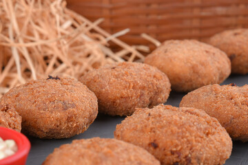 Fried and breaded codfish cake, fish empanadas, codfish cake, Brazilian-style codfish cakes, meat disc
