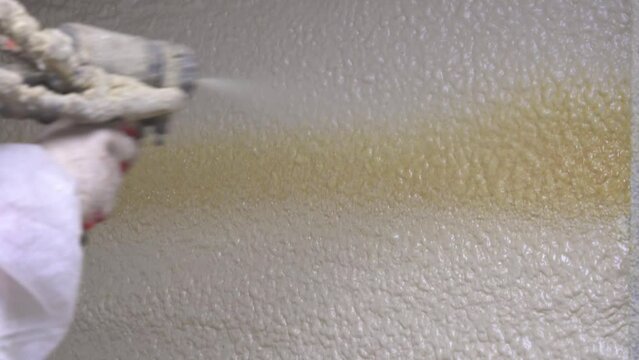 Injection of FOAM insulation into the voids of the walls