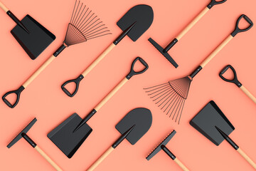 Garden shovel, pitchfork and rake on orange background, summer camping concept