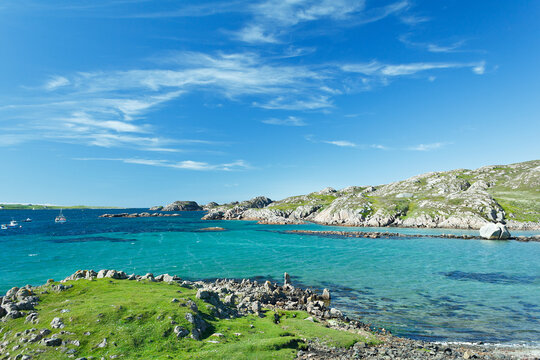 Beach at Fionnphort, Mull with turquoise sea water and blue sky, hebrides, Scotland, copy space
