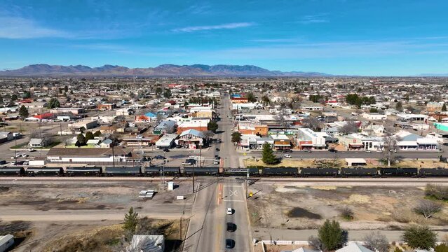 Aerial view of Willcox on Railroad Avenue at W Maley Street with freight train in historic city center of Willcox, Arizona AZ, USA. 