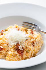 Italian risotto with dry tomatoes and capers