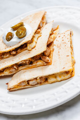 quesadilla with chicken meat and jalapenos