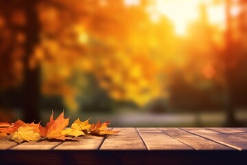Naklejka na ściany i meble Autumn Wooden Table_With Orange Leaves At Sunset