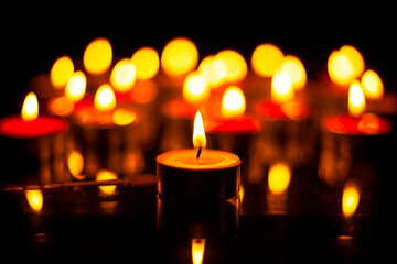 macro candle,Candles Burning at Night. White Candles Burning in the Dark