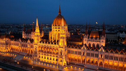 Fototapeta premium Aerial view of Budapest Hungarian Parliament Building at night. Travel, tourism and European Political Landmark Destination, Hungary