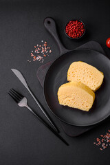 Delicious omelet with milk, spices and herbs cut into large pieces