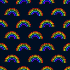 Small bright colorful rainbow isolated on dark blue background. Cute seamless pattern. Vector simple flat graphic illustration. Texture.