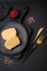 Delicious omelet with milk, spices and herbs cut into large pieces